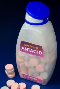 photo of antacid tablets and bottle container